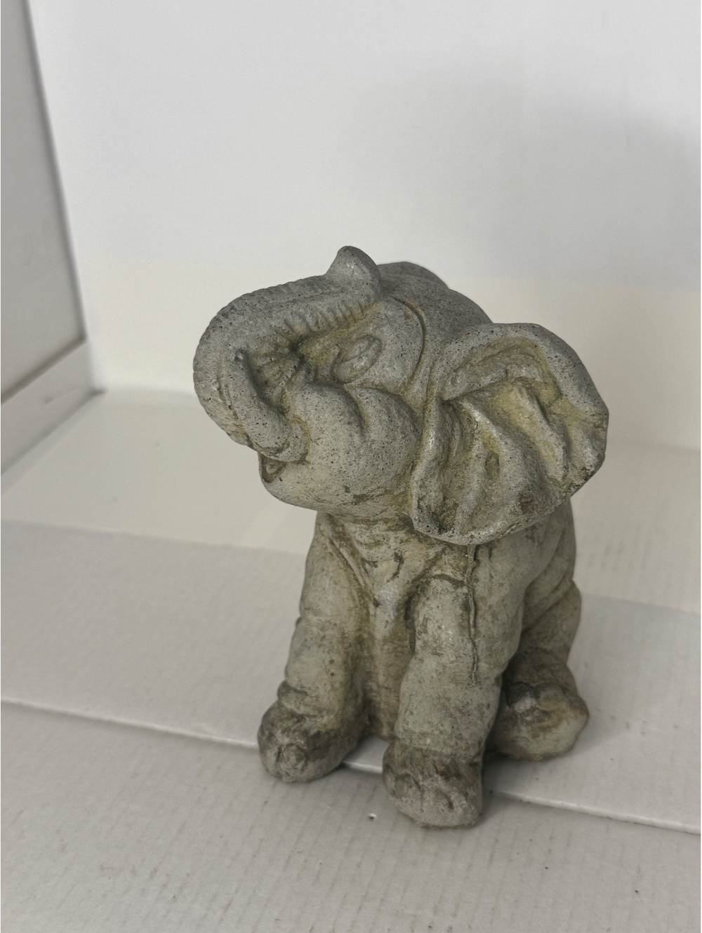 Small stone elephant figurine